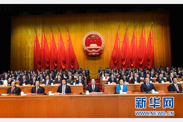 10月1日，慶祝中華人民共和國成立66周年暨新疆維吾爾自治區(qū)成立60周年大會在新疆人民會堂隆重舉行。 新華社記者 饒愛民 攝