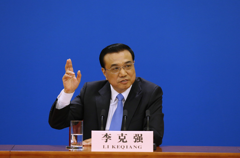 3月15日，國務院總理李克強在北京人民大會堂與中外記者見面，并回答記者提問。 新華社記者 沈伯韓 攝