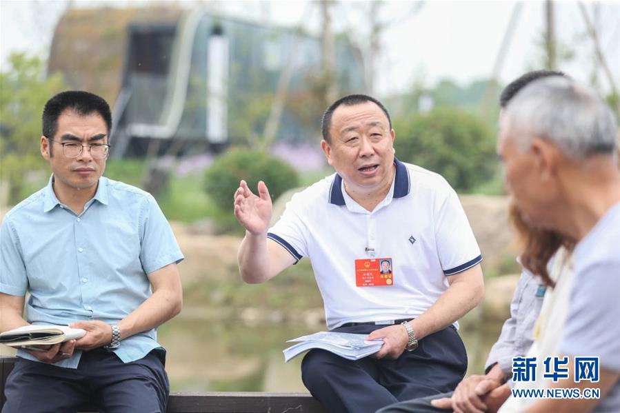 （新華全媒頭條·兩會精神看落實·圖文互動）（2）整體謀劃、系統(tǒng)升級、全面提升——落實全國兩會精神織牢織密公共衛(wèi)生防護網(wǎng)