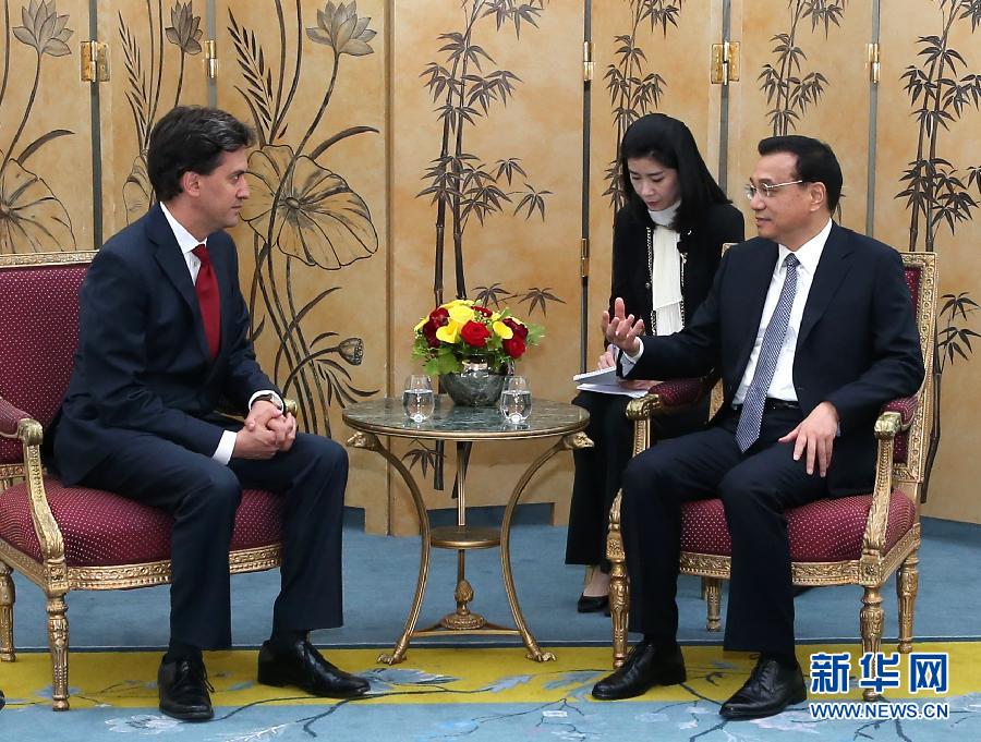 6月18日，國(guó)務(wù)院總理李克強(qiáng)在倫敦會(huì)見(jiàn)英國(guó)工黨領(lǐng)袖埃德·米利班德。新華社記者 龐興雷 攝