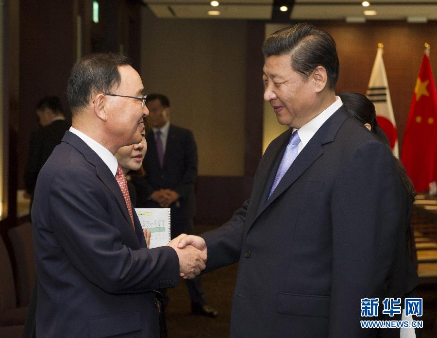 7月4日，國家主席習(xí)近平在首爾會(huì)見韓國總理鄭烘原。 新華社記者謝環(huán)馳攝  