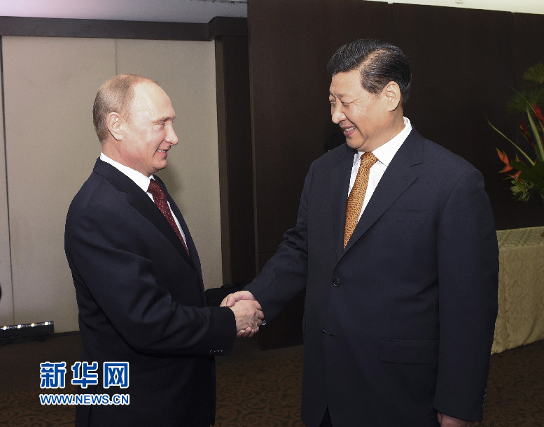 7月14日，國家主席習(xí)近平在巴西福塔萊薩會見俄羅斯總統(tǒng)普京。新華社記者李學(xué)仁攝