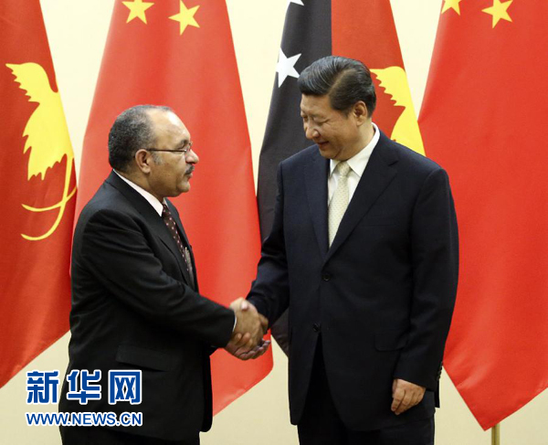 11月22日，國家主席習近平在斐濟楠迪會見巴布亞新幾內(nèi)亞總理奧尼爾。 新華社記者姚大偉攝 