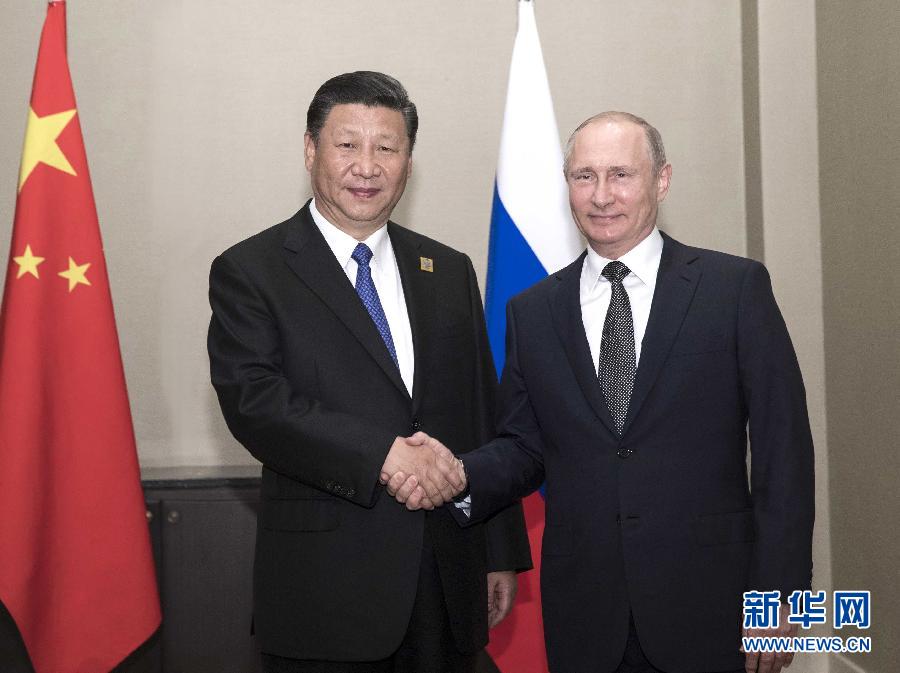 6月8日，國(guó)家主席習(xí)近平在阿斯塔納會(huì)見俄羅斯總統(tǒng)普京。 新華社記者蘭紅光 攝