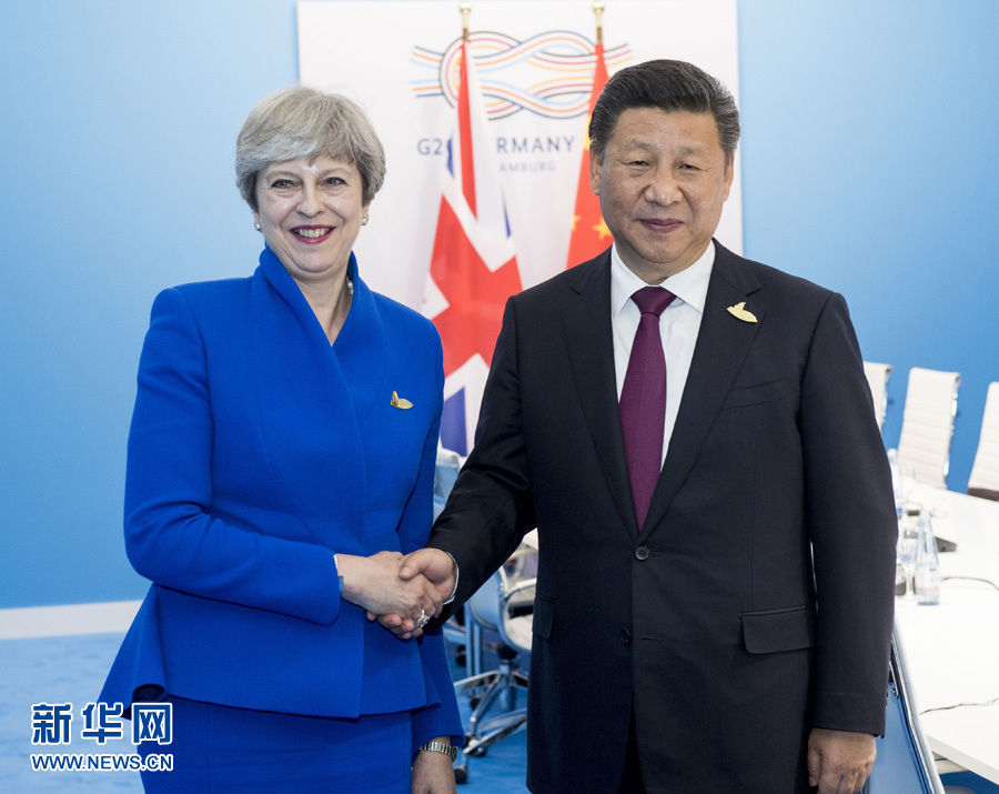 7月7日，國(guó)家主席習(xí)近平在漢堡會(huì)見英國(guó)首相特雷莎·梅。 新華社記者李學(xué)仁 攝
